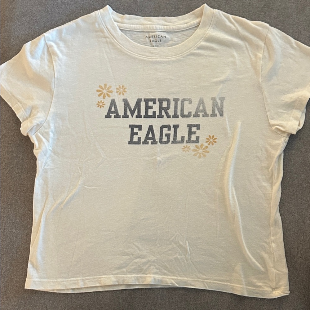 American Eagle Outfitters Cream Tee with Gray and Gold Accents